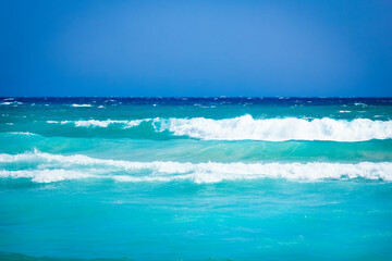 beautiful beach with waves in the nature of the background