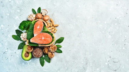 Ketogenic low carbs diet concept. Diet for the heart and blood vessels: nuts, salmon, avocado,...