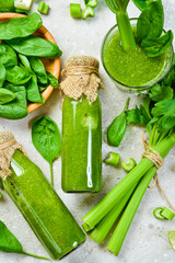 Vegetarian detox diet green smoothies with fresh celery, spinach. Healthy food. Free space for text.