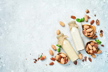 Pecan nut milk. Dairy free, lactose free milk. Top view. Vegan drinks.