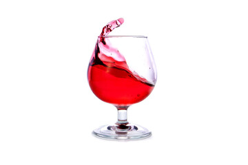 moving a glass of red wine on a white background