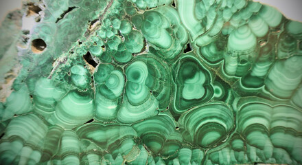 Beautiful piece of polished green natural malachite crystal with formations