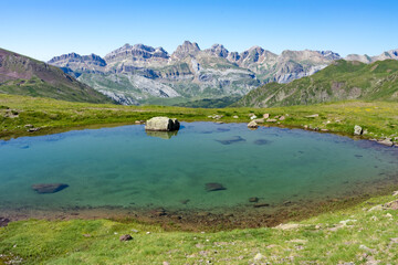 Fototapeta na wymiar Lakes of Astun hike and views of the valley in Aragon pyrenees mountains in summer in a suuny day