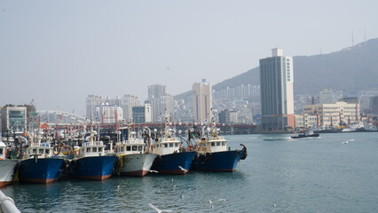 Fototapeta na wymiar fishing boats moored at Busan Port