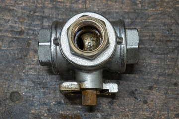 Three-way valve worn and stuck.