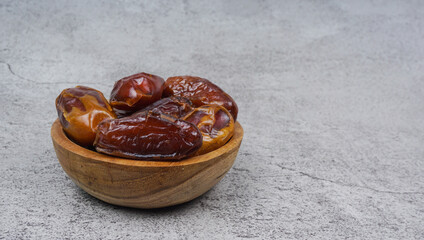 Selective focus sukkari dates or kurma sukari. The taste is sweet and soft. Ramadan Food Concept