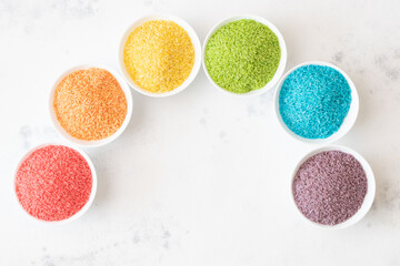 Rainbow rice in white pots