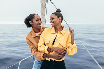 Positive black girlfriends on yacht