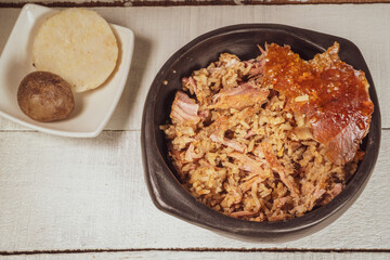 Typical lechona from Tolima with rice