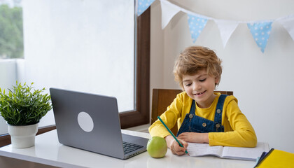 Caucasian smiling child schoolboy or girl studying at home using laptop remote education. Doing...