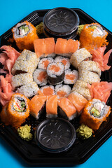 A photo of a lot of sushi in one package