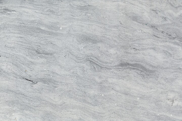 natural pattern of white marble saw the surface streaked like a flowing river