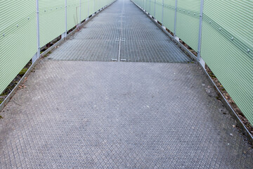 pedestrian bridge in an industrial area