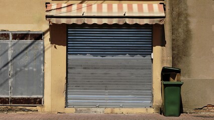 closed trade shutter with awning