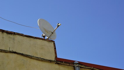 roof satellite dish against the sky