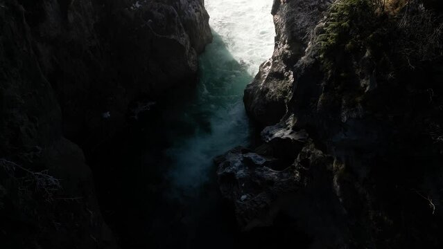 the lech fall near f&uuml;ssen in bavaria in the alps where a lot of water flows into the valley and the water flows back and forth between the rock walls recorded with a drone