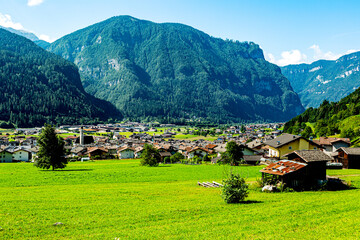 Mezzano Imerm, village with Dolomite peaks in Val di Primiero Noana of Trentino Alto-Adige, Italy 