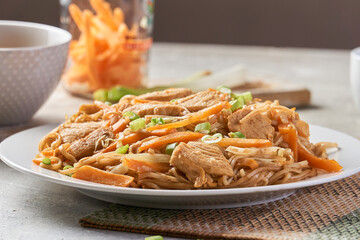 Chicken chow popular oriental dish with noodles and vegetables