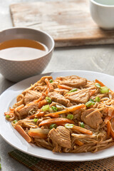 Chicken chow popular oriental dish with noodles and vegetables