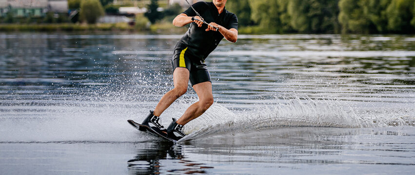 wakeboarding on summer lake. extreme sport on vacation