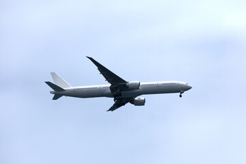 Fototapeta na wymiar Wide-body jet airliner in the sky