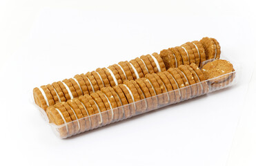 biscuit sandwich cookies, baked biscuits stuffed with milk cream in plastic packaging,