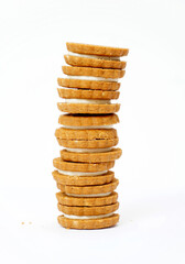 stack of biscuit sandwich cookies, baked biscuits stuffed with milk cream 