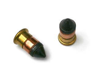 Two .22 CB caps on white background