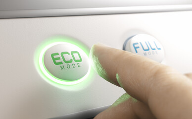 Finger pressing eco mode button. Energy saving concept