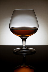 Backlit glass of cognac