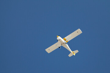 Ultralight airplane flying - obrazy, fototapety, plakaty