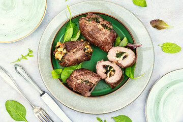 Roasted veal roulades on a plate