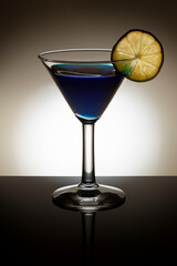 Backlit glass of blue curacao