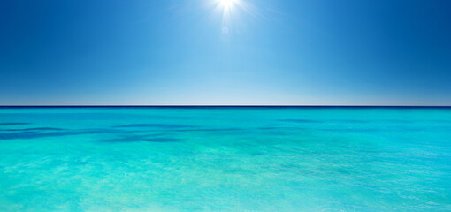 tropical Maldives island with white sandy beach and sea