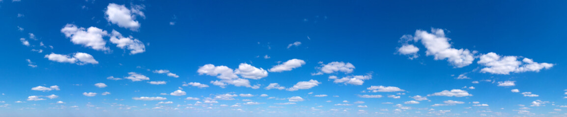 Blue Sky background with tiny Clouds. Panorama background