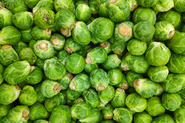 Stack of brussels sprouts on a market stall