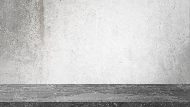 grey marble table in front of rusty grey concrete wall background with lighting from above. panoramic banner mockup for advertising and product displayed. indutrial interior concept for loft design.