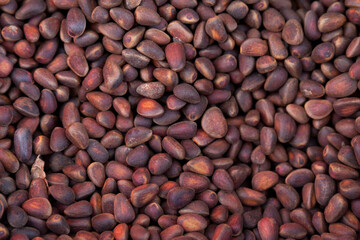 Stack of Siberian pine nuts on a market stall