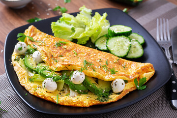 Omelette with mozzarella cheese and avocado. Ketogenic, keto diet breakfast.