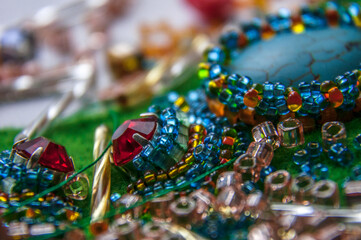 The process of creating jewelry from beads of precious and semi-precious stones.