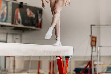  girl gymnast athlete exercise on balance beam in gymnastics gym © sports photos