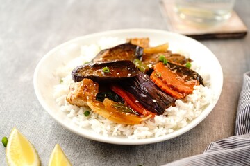 Stir fried Thai Eggplant  with vegetables in sweet sauce served with Jasmine rice