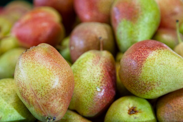 Stack of pears on a market stall
