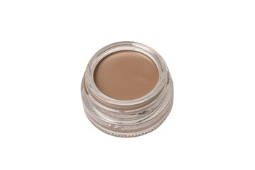 A brow pomade in blonde shade with brush isolated on a white background.