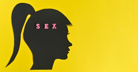 The concept of a woman thinking about sex. The shape of the head. copy space