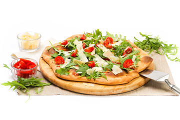Pizza isolated. Pizza with tomatoes and arugula. Pizza on white background. Pizza seen from above. Pizza cut into slices. Pizza isolated on white. Pizza with ingredients. Delicious italian pizza. Food