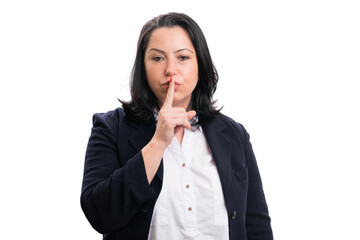 Entrepreneur woman shush gesture touching lips with finger