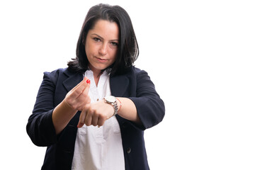 Serious female entrepreneur making time means money gesture