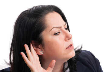 Close-up of businesswoman touching ear as listening concept