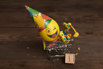 date April 1. Creative concept for April Fools' Day. Wooden letters April 1st and festive decor on the wooden background